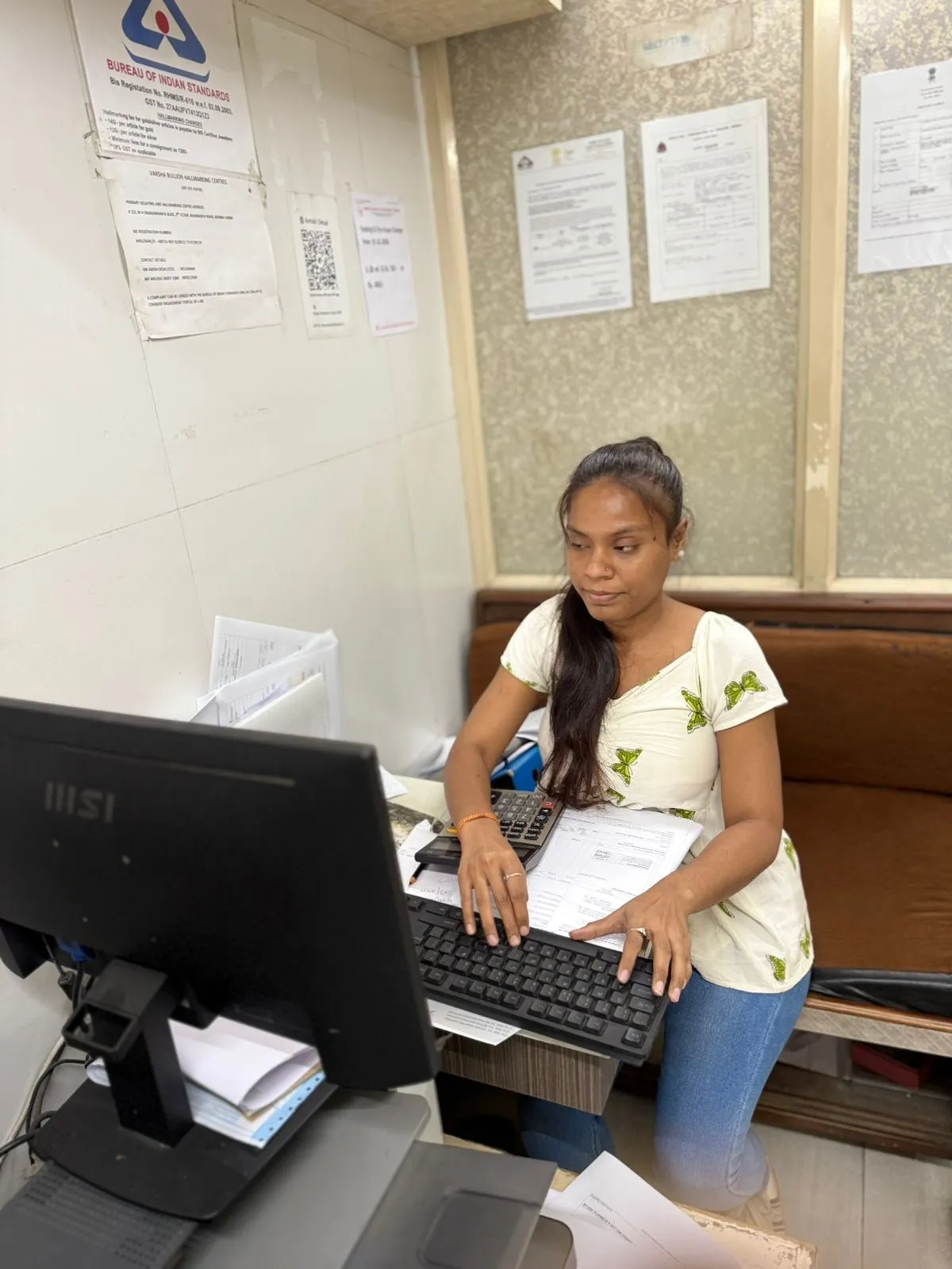 Front desk at Varsha Bullion Hallmarking Centre with BIS certificate